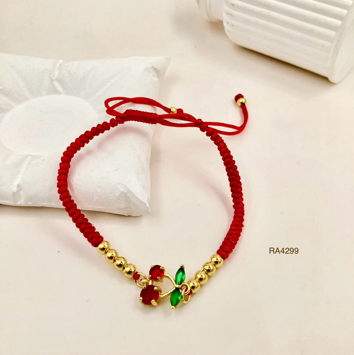 RA4299 - PULSERA CEREZA HILO ROJO RODIO