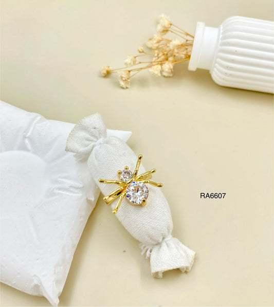 RA6607 - ANILLO ARAÑA BLANCA RODIO