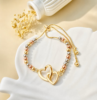 RA6705 - PULSERA EN RODIO TRES OROS