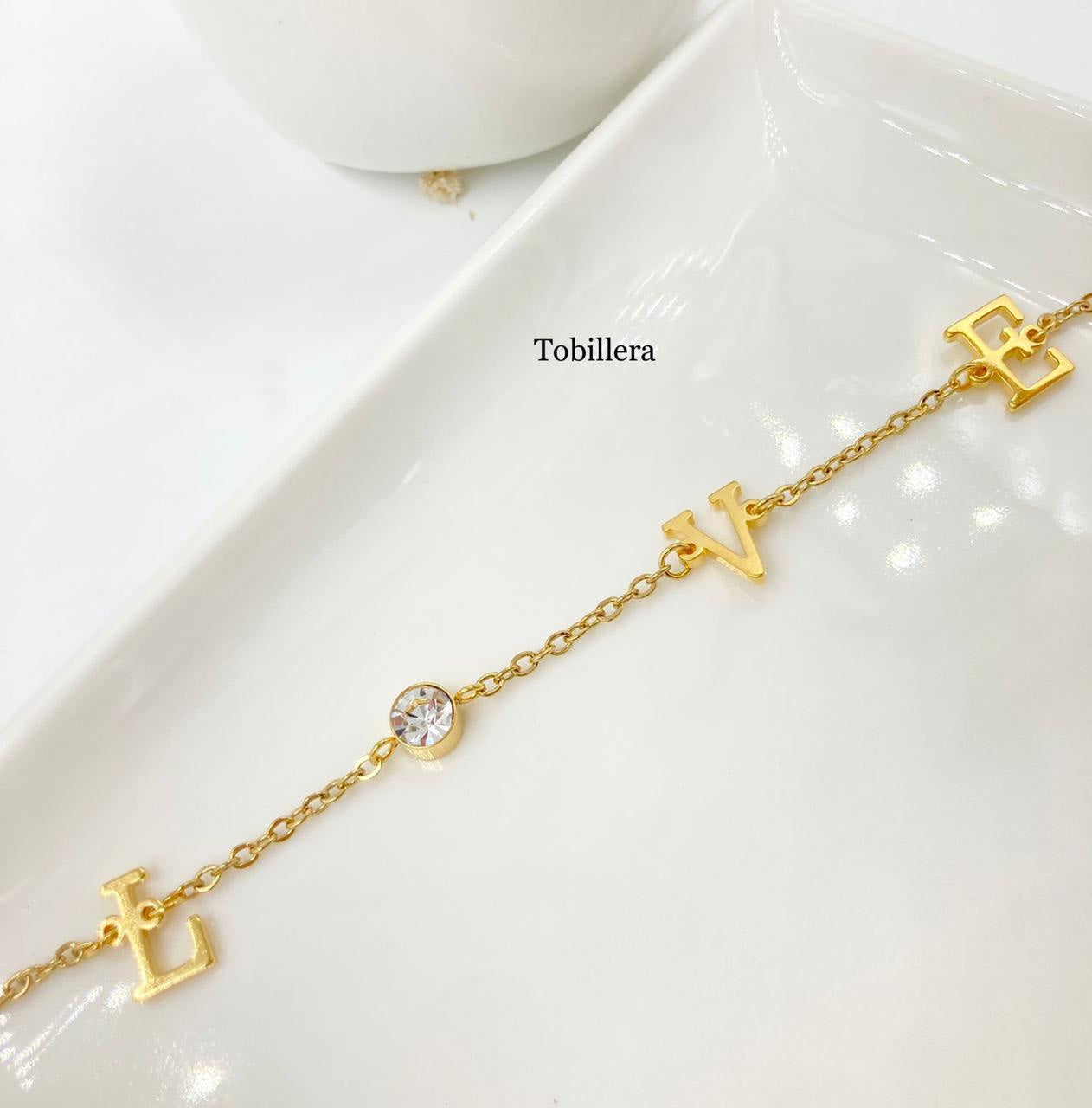 TB001 - TOBILLERAS LOVE
ACERO