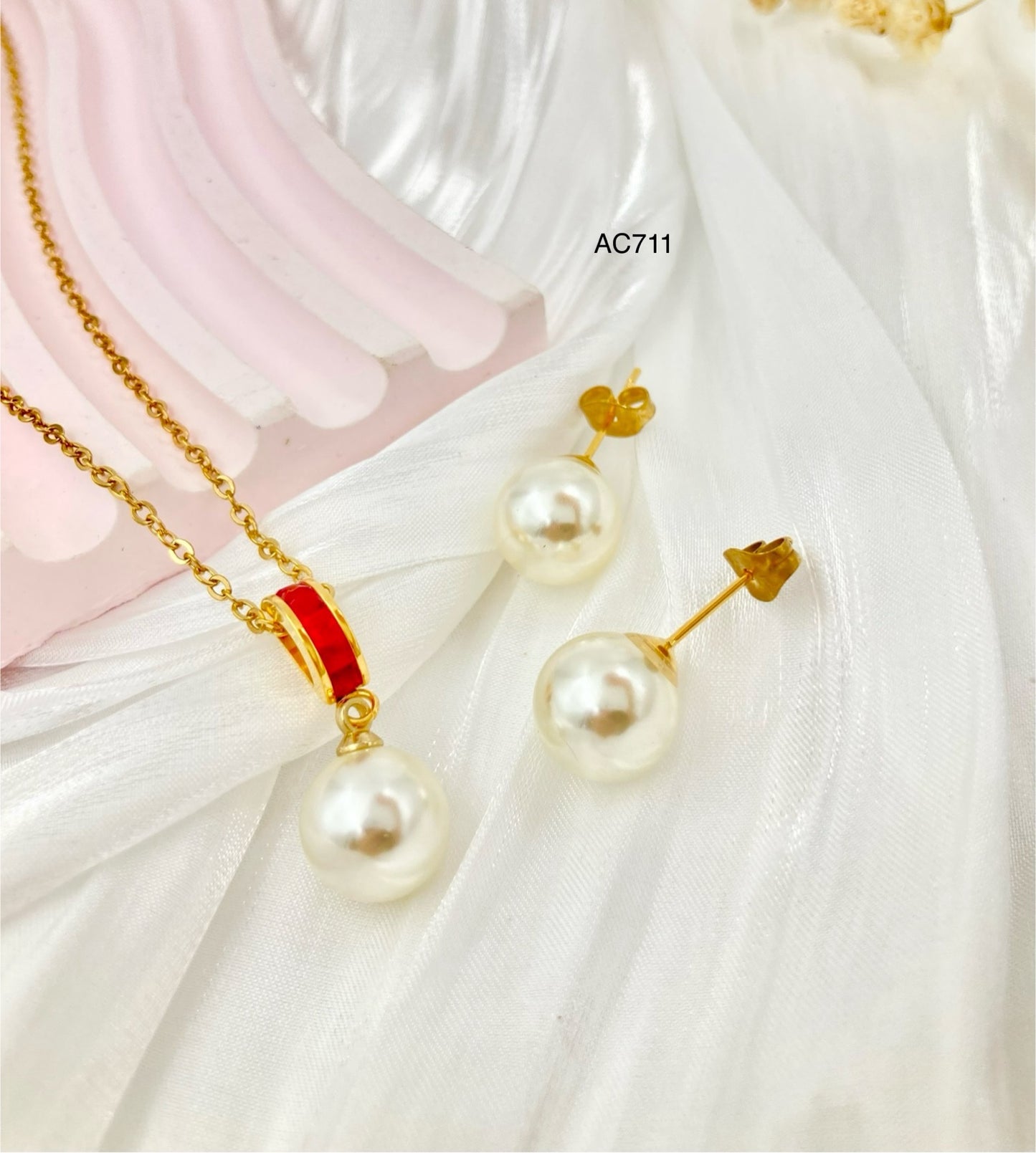 AC711 - JUEGO ACERO PERLAS PIEDRA ROJA