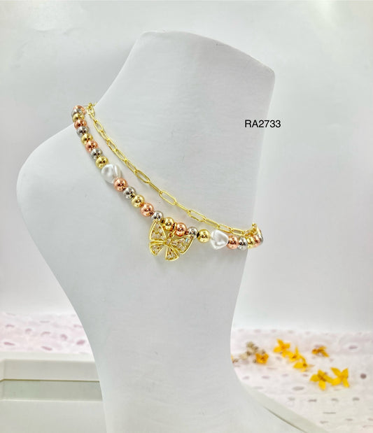 RA2733 - TOBILLERA EN RODIO 3 OROS
