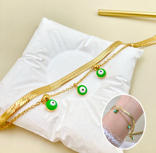 AC1131 - PULSERA ACERO OJITOS VERDES