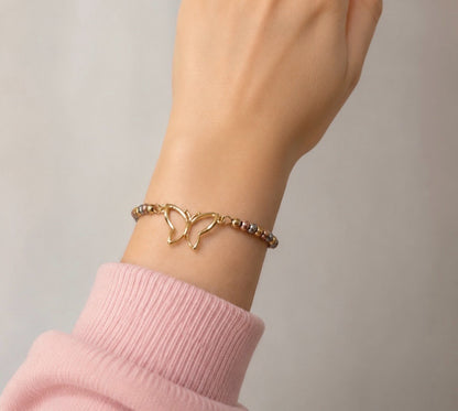 RA6704 - PULSERA EN RODIO TRES OROS